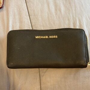 Michael Kors Black Zip Around Saffiano Wallet with Gold Logo